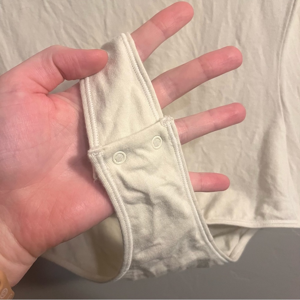SKIMS Short Sleeve Crew Bodysuit in Ivory Cream - Picture 9 of 16